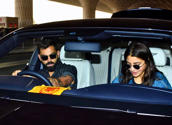 Virat Kohli and Anushka Car